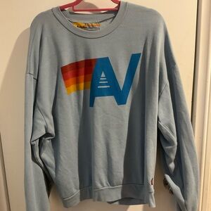 Aviator Nation Light Blue Crewneck with Rainbow Logo